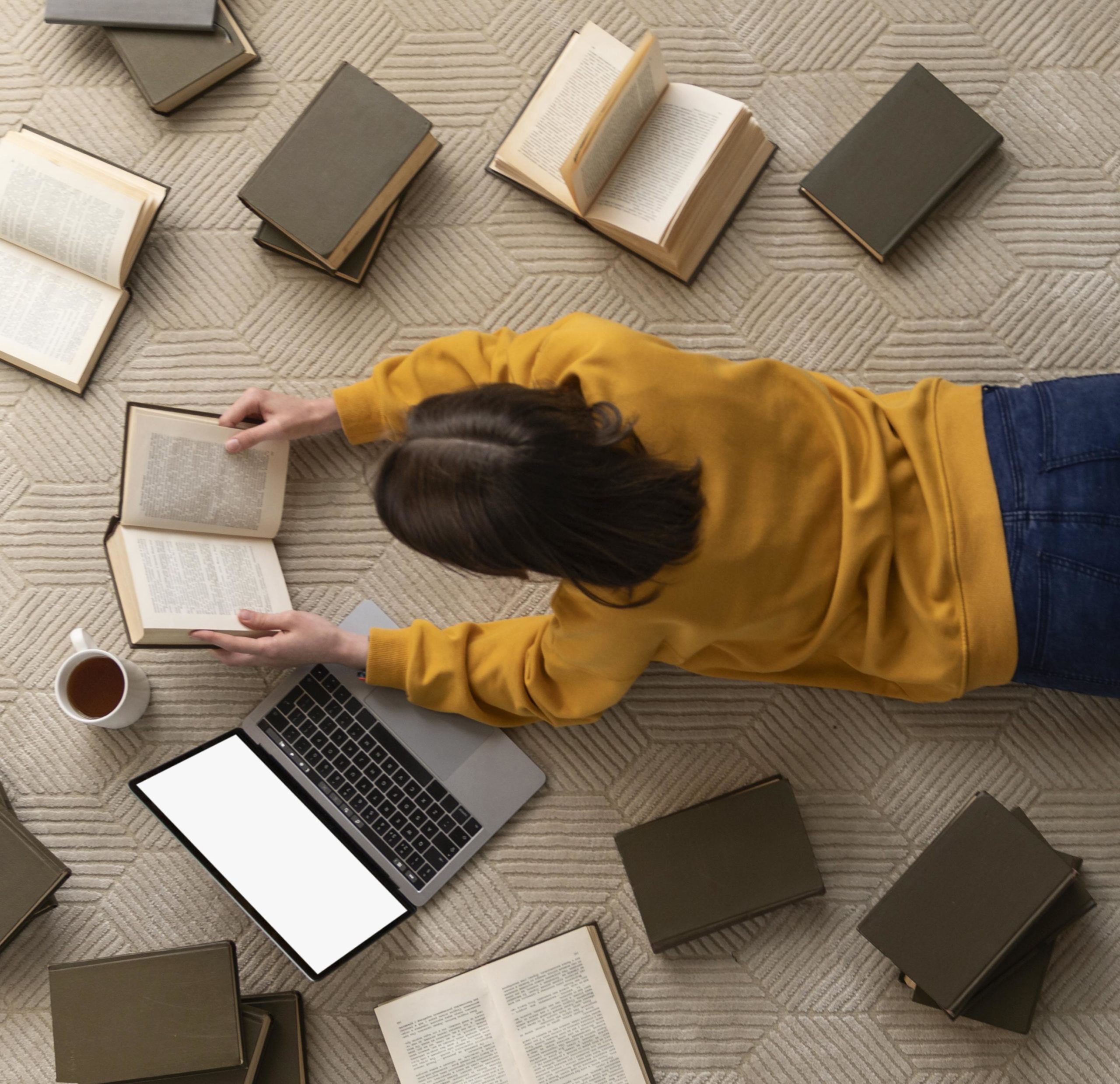 medium shot woman with books scaled